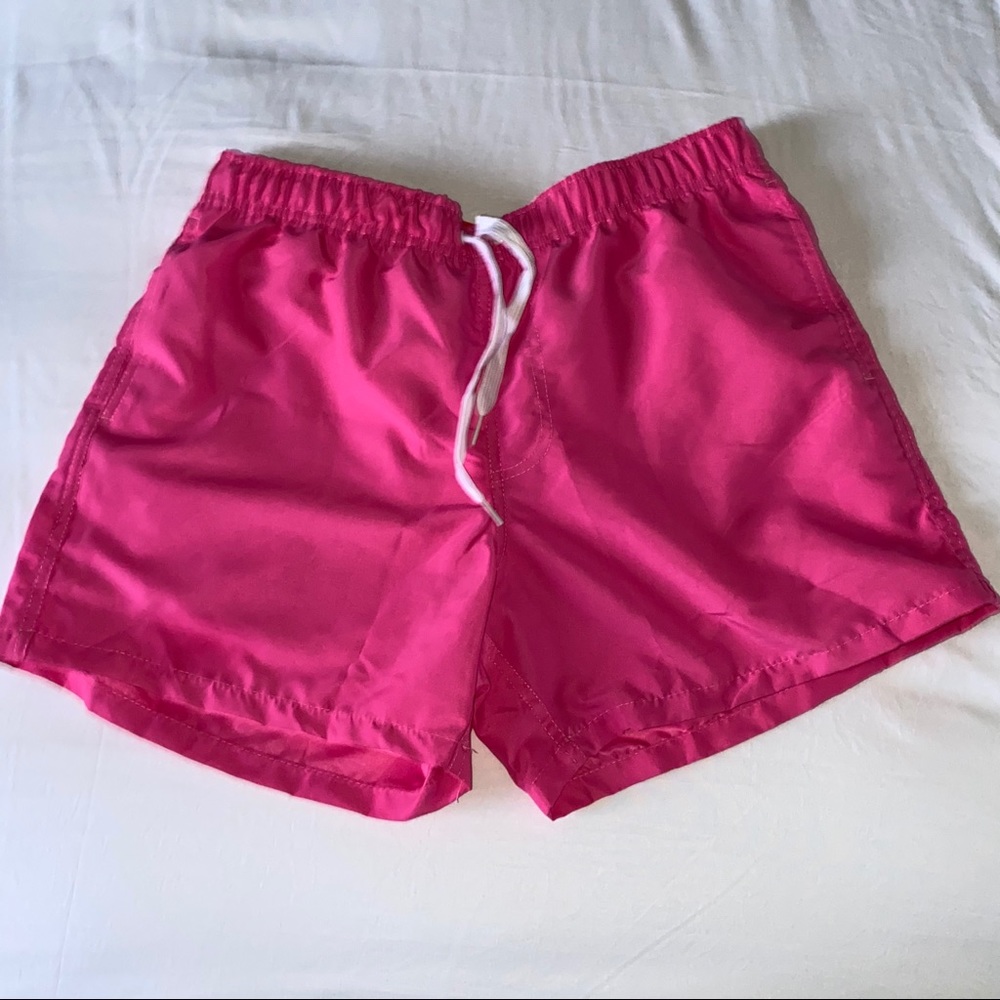 Pink swim shorts